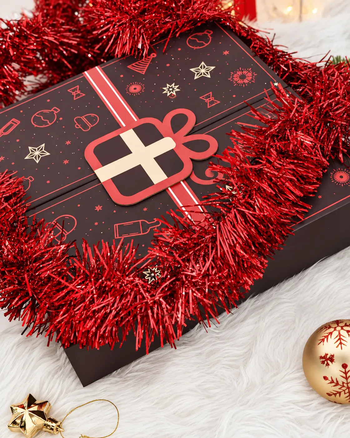Wrapped Story advent calendar styled with red tinsel, baubles and warm lights